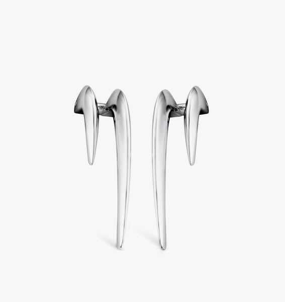 Sculptural edgy earrings design handcrafted in precious metal.
