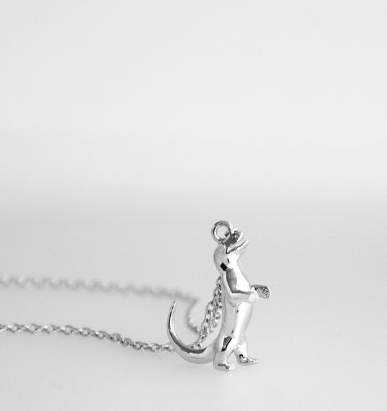Adorable komodo dragon silver pendant with sterling silver chain and rhodium plating.